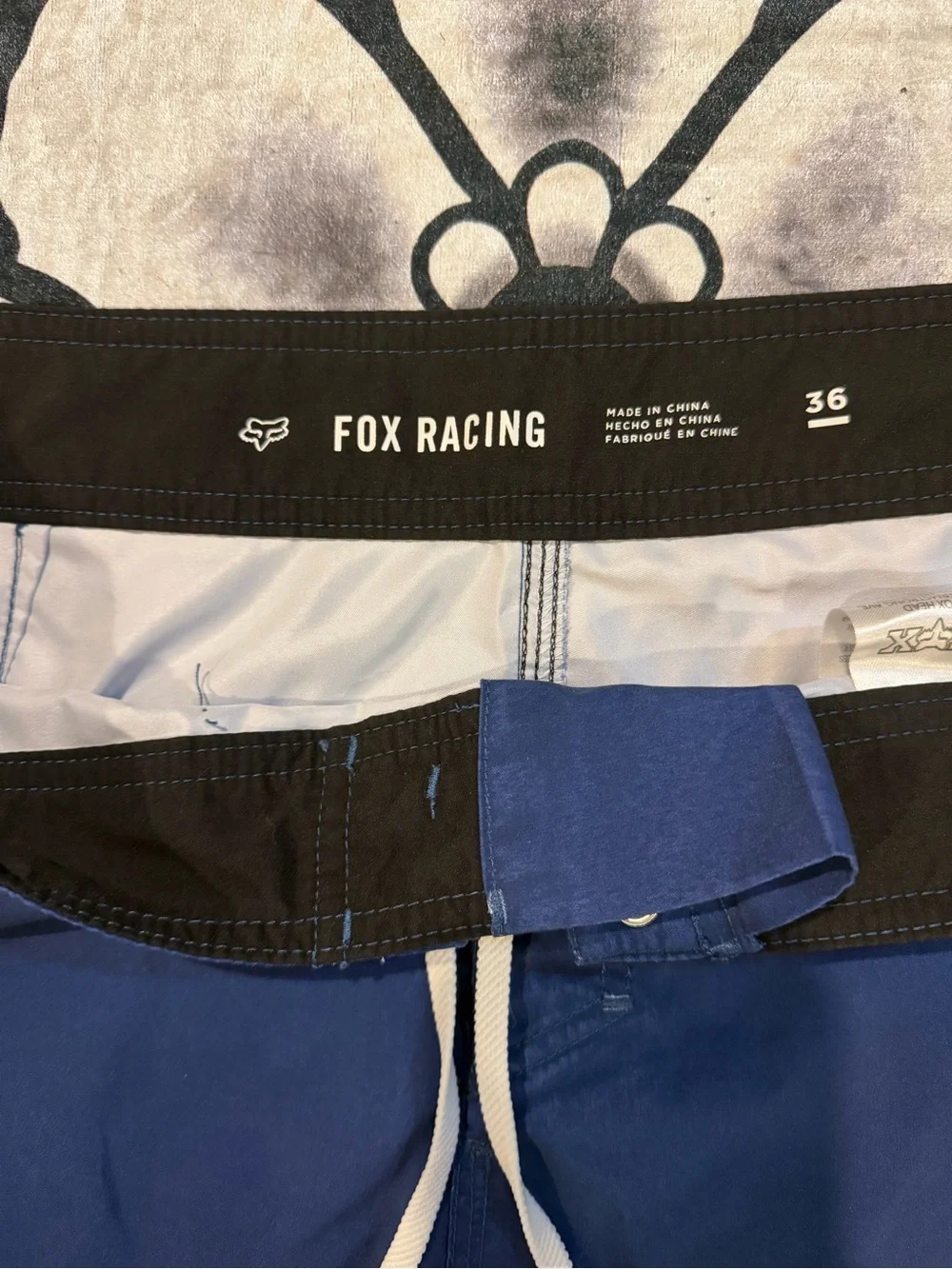 FOX Men's Blue Swim Trunks with Multicolor Stripe Accent